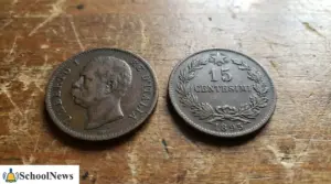 Moneta da 15 centesimi con effigie di Umberto I e rovescio con valore 15 centesimi e data 1895
