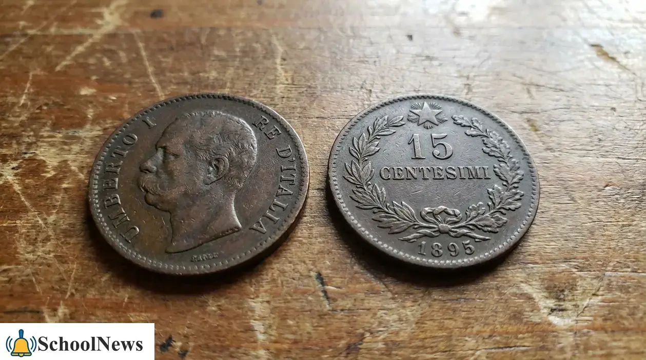 Moneta da 15 centesimi con effigie di Umberto I e rovescio con valore 15 centesimi e data 1895